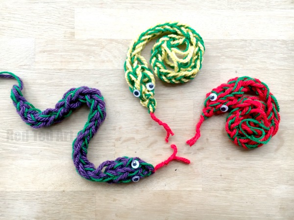 Finger-knitted yarn snakes