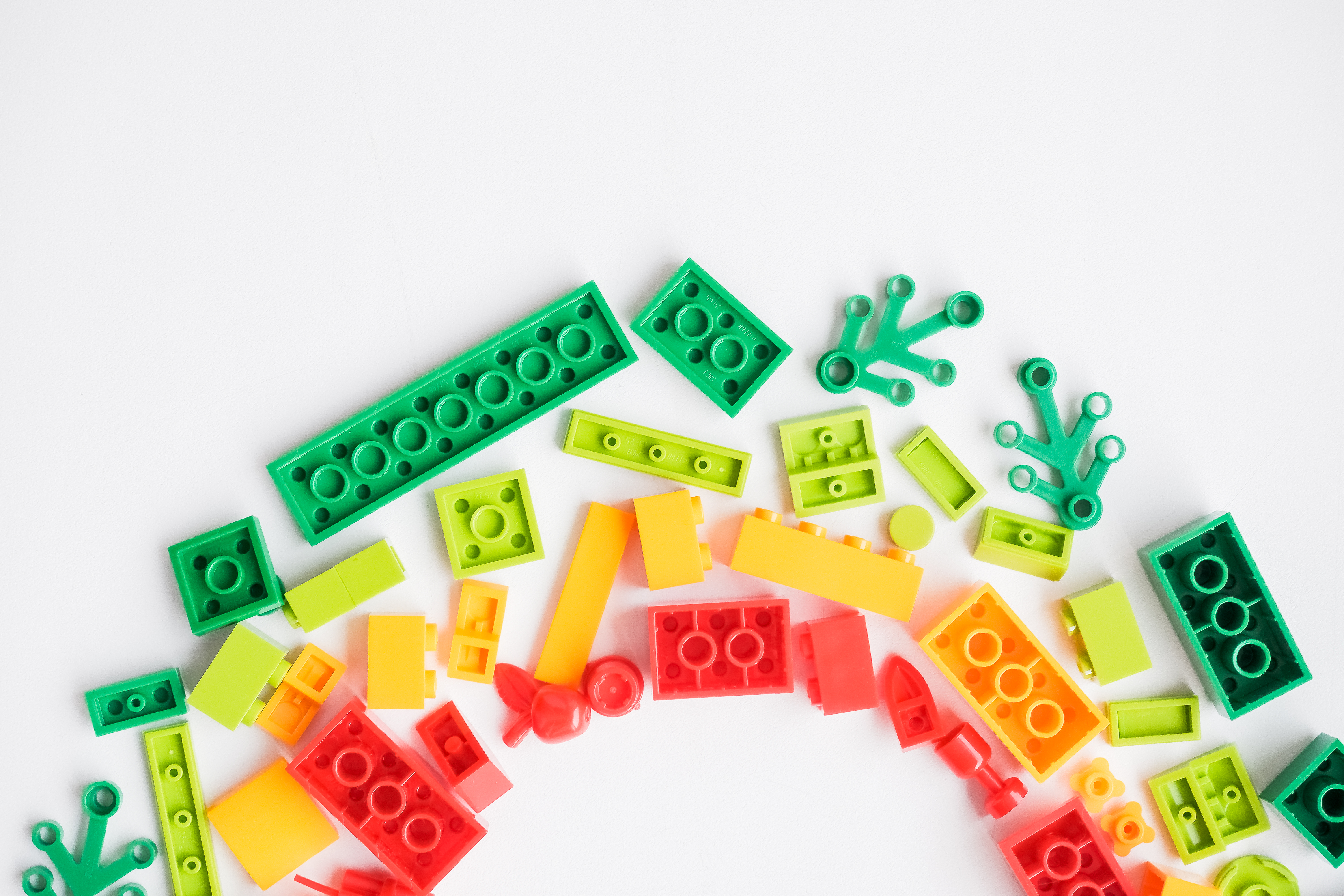 Legos scattered in an arc shape