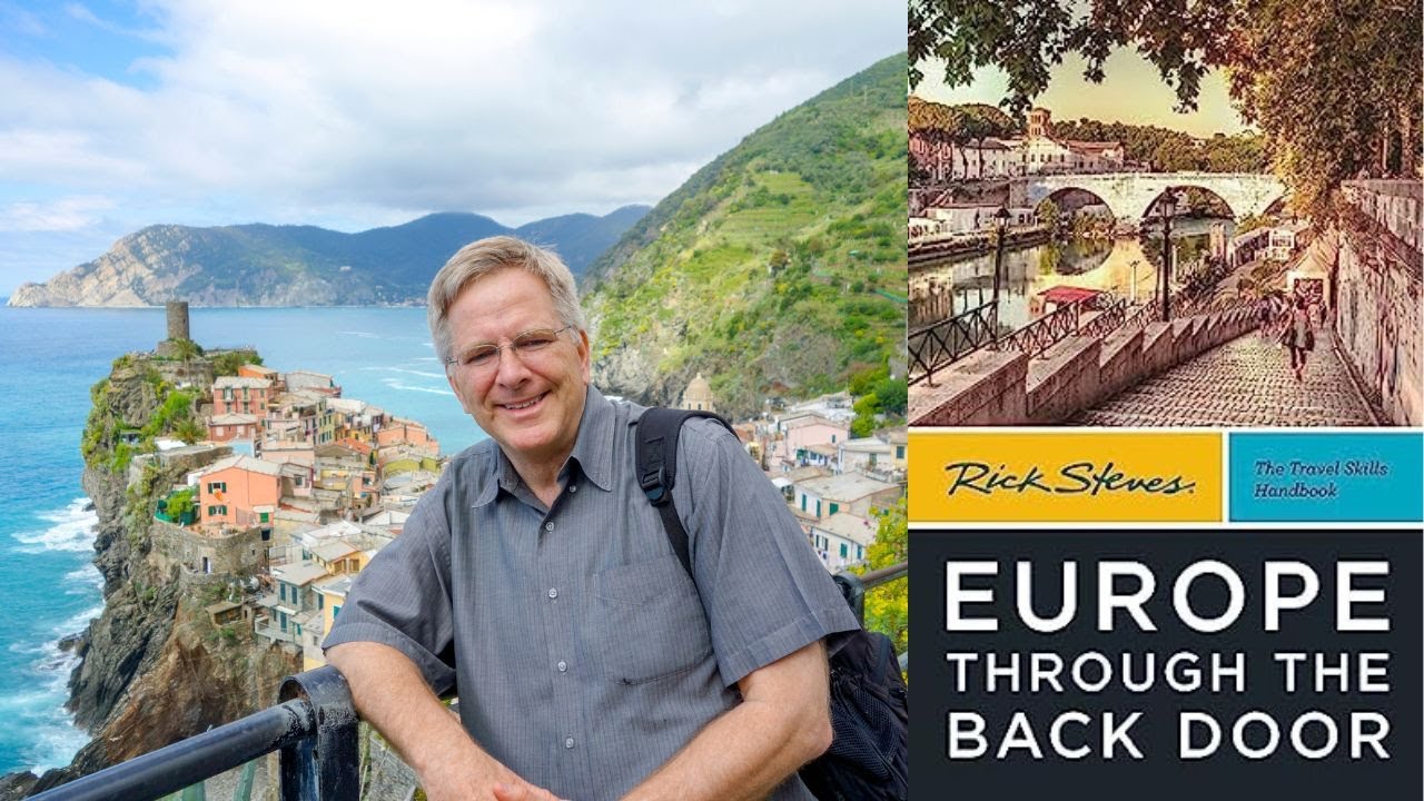 Rick Steves with the cover of his book: Europe Through the Back Door 