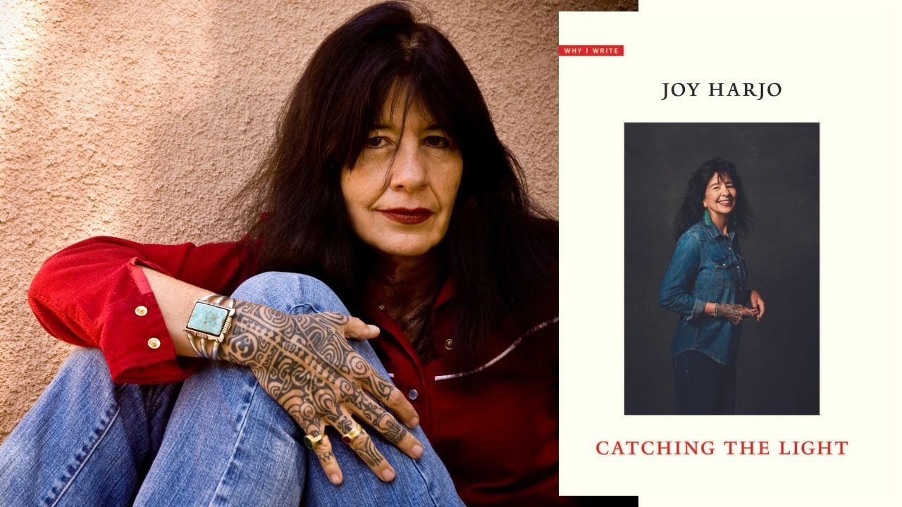 Author Joy Harjo with the cover of her book Catching the Light 