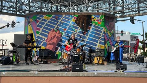 The Radicals (Anita Chase, Rodney Goodwin, Bill Martin, and Kelly Hogarty) playing on the Ash St. Stage 